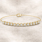 צמיד טניס קלאסי, המשלב 13 יהלומים טבעיים במשקל כולל של 1.00 קראט, משובצים בזהב 14 קראט