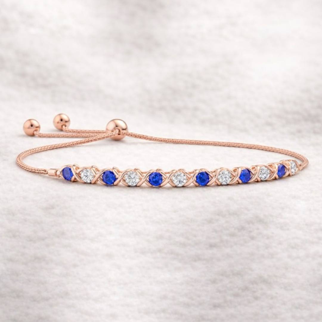 צמיד זהב אלגנטי המשלב ספירים כחולים טבעיים עם יהלומים טבעיים, הצמיד עשוי זהב 14 ורוד