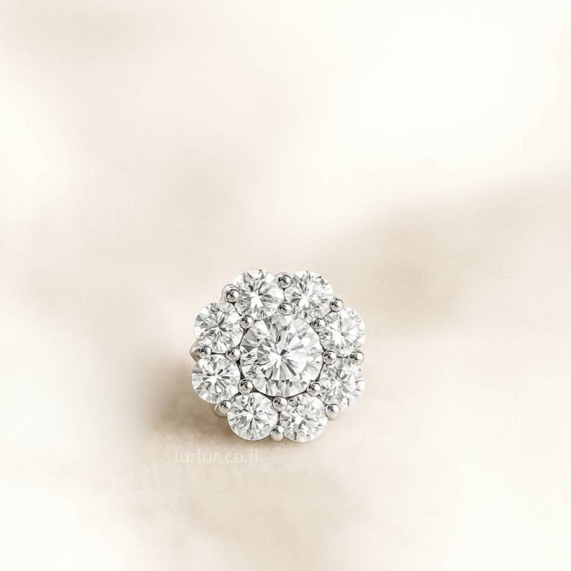earrings with clear diamonds on a beige background