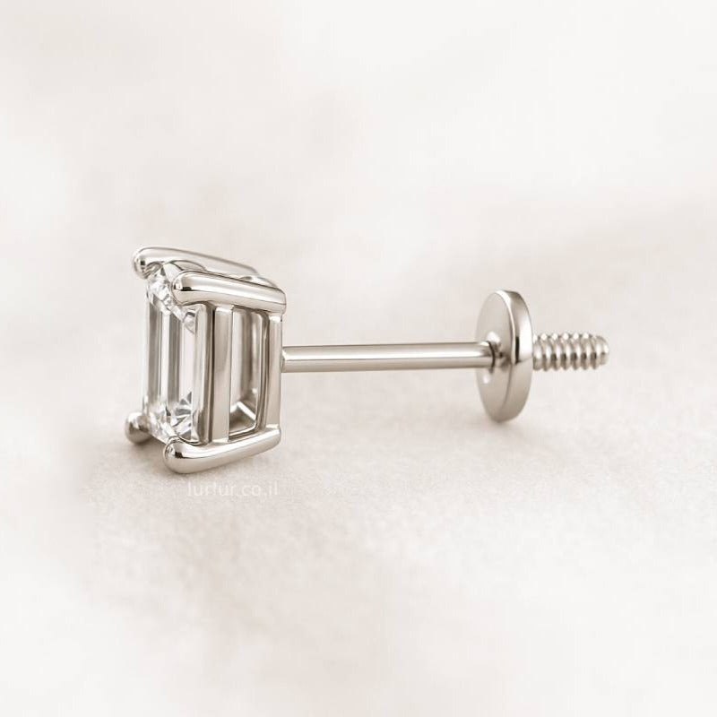 earring with a clear gemstone on a white background