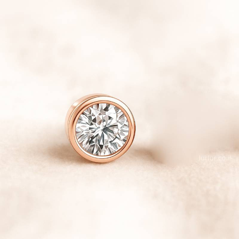 Rose gold diamond earring on a soft beige background