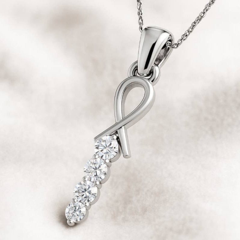 pendant with diamond accents on a soft white background