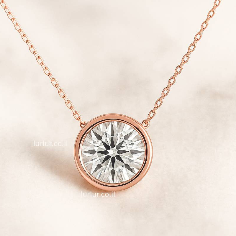 Rose gold necklace with a diamond pendant on a light beige background