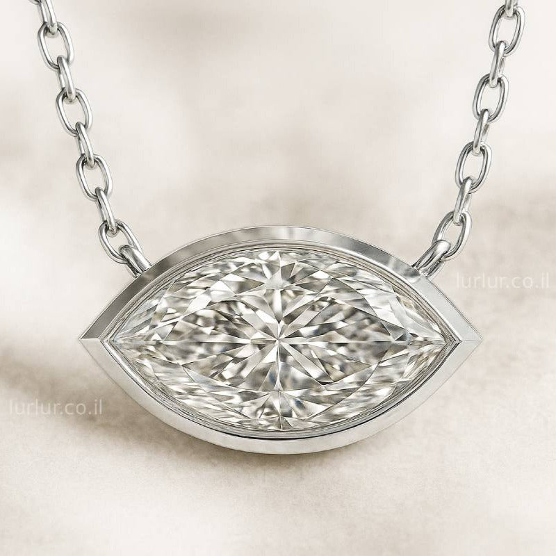 Diamond necklace with a marquise-shaped pendant on a beige background