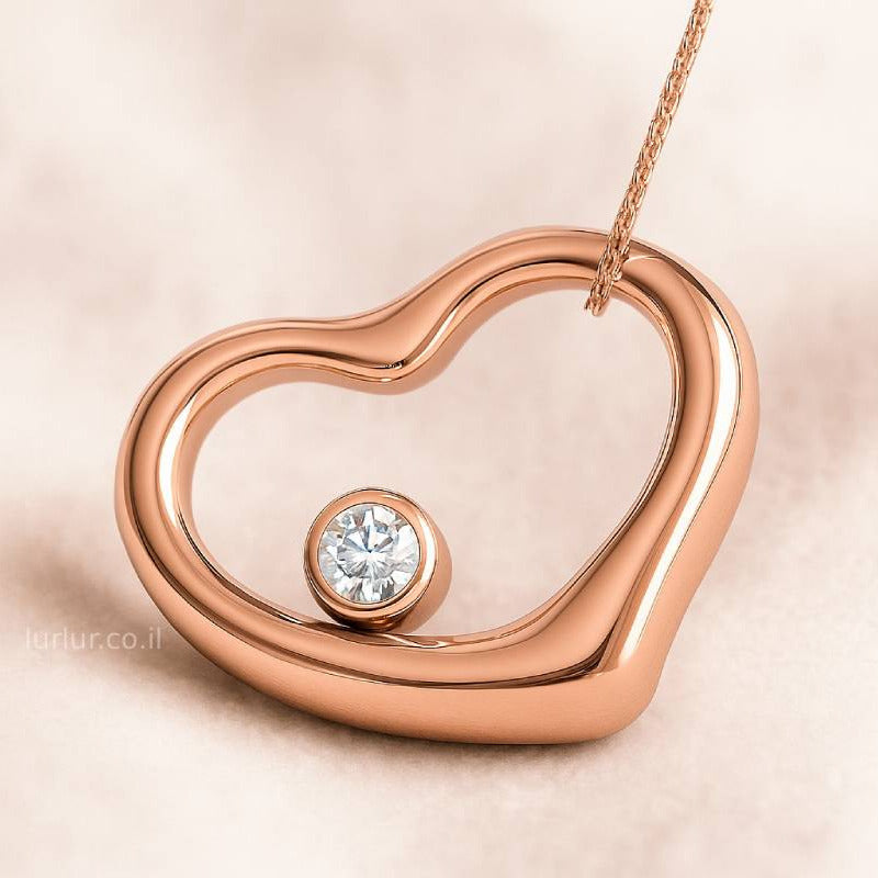 Rose gold heart-shaped pendant with a diamond on a beige background