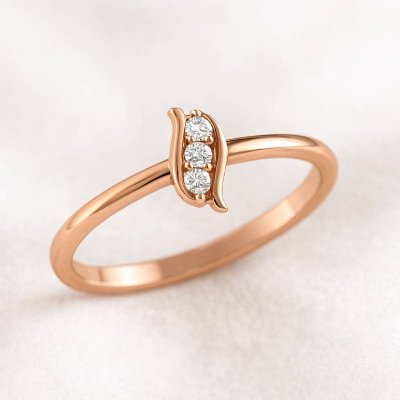 Rose gold ring with small diamonds on a light background