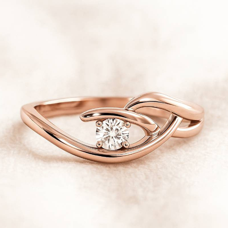 Rose gold ring with a diamond on a soft beige background