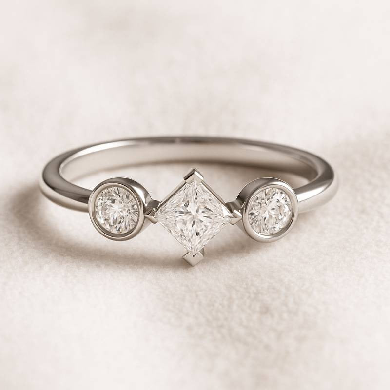  ring with three diamonds on a light background