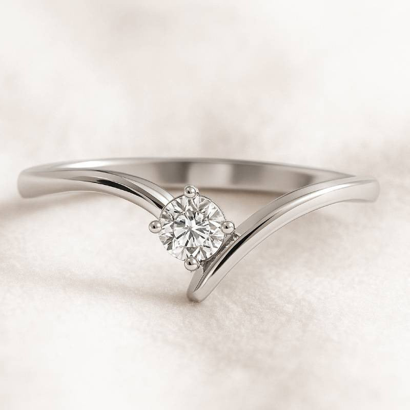 Diamond ring on a soft pink background