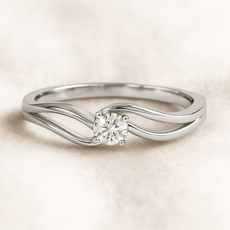  ring with a diamond on a beige background
