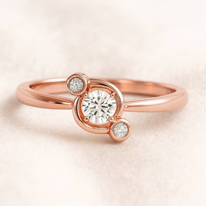 Rose gold ring with a diamond on a light beige background