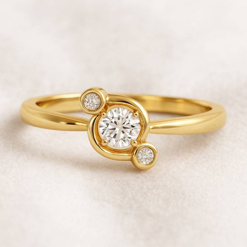 Gold ring with a diamond on a light beige background