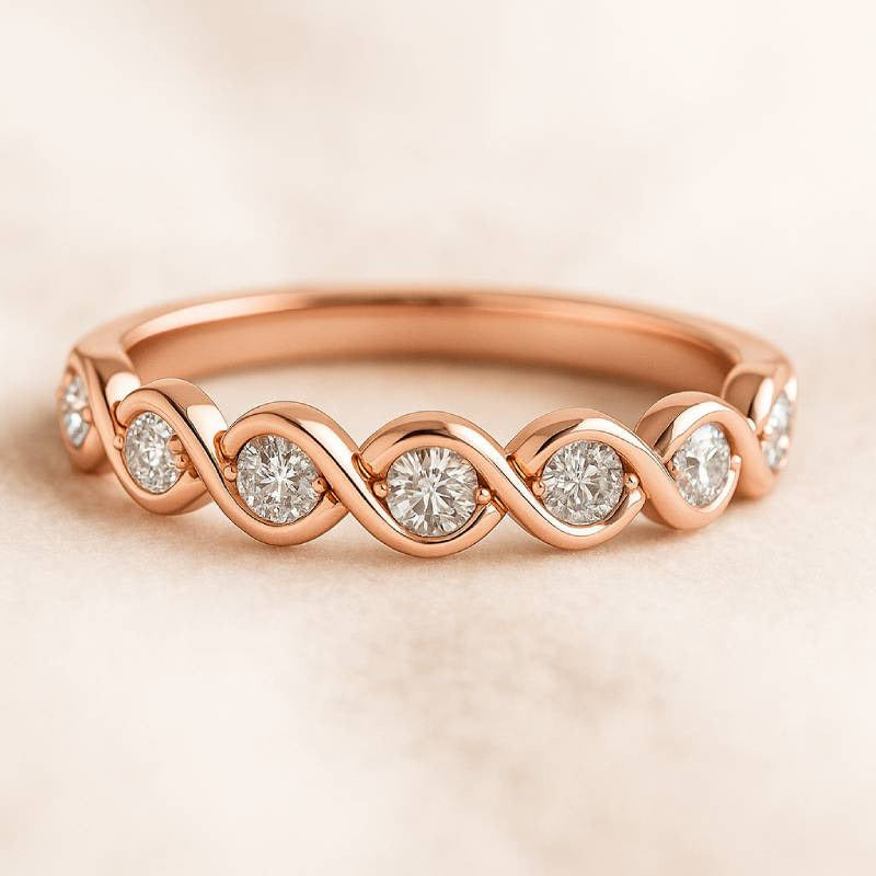 Rose gold ring with diamonds on a beige background