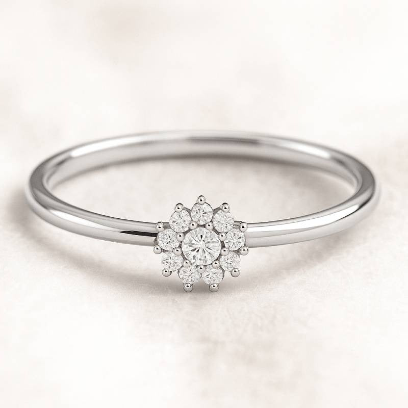 ring with a diamond flower design on a light background