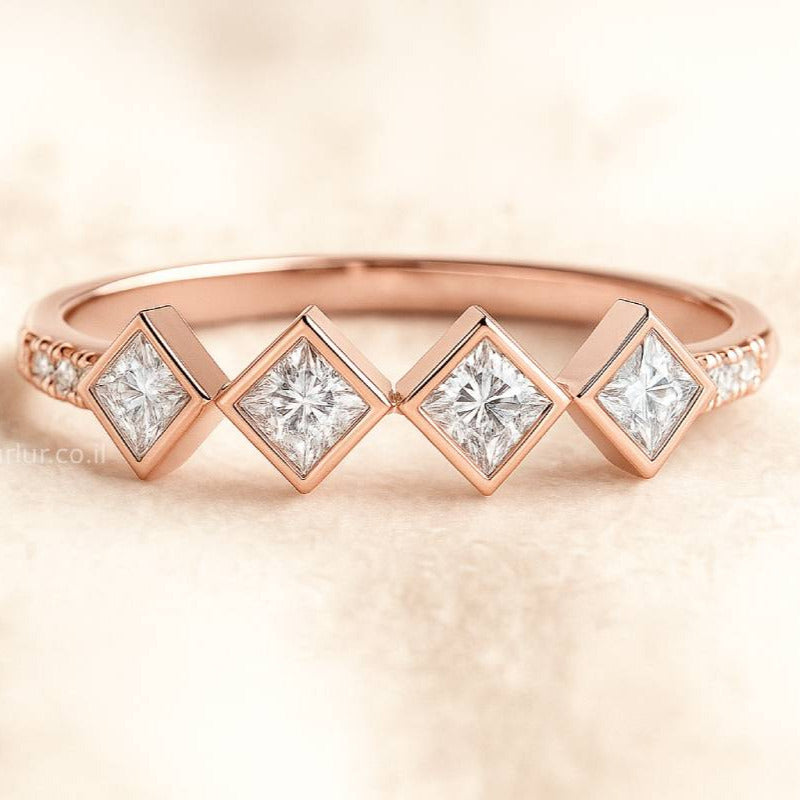 Rose gold ring with diamond stones on a soft beige background