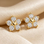 Gold earrings with heart and diamond 