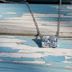 Diamond necklace on a wood background